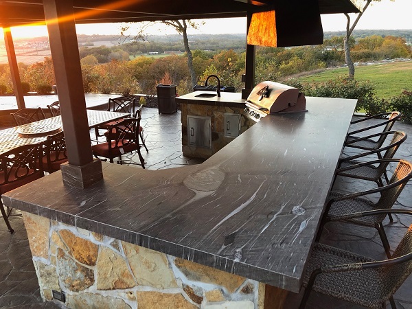 outdoor kitchen dark countertops custom fabricated stone