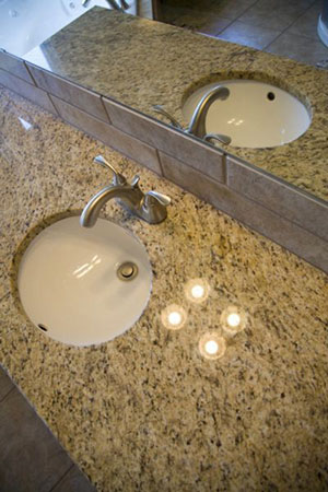 giallo ornamental granite countertops and sink with roundover edge