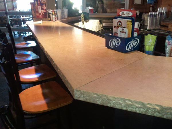 limestone rockface edge on bar countertop