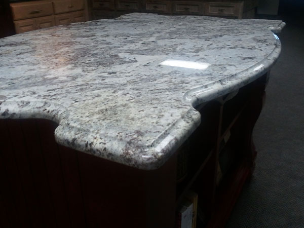 kitchen island with custom fabricated nordic ice granite countertops
