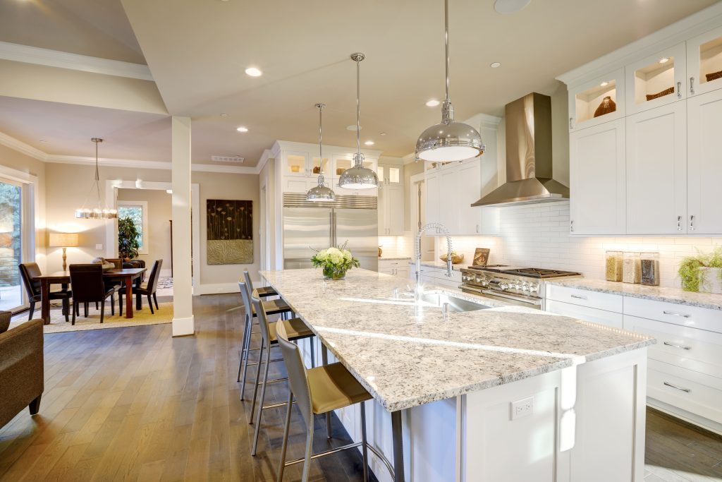 light modern kitchen with custom fabricated stone countertops